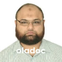 Implantologist at Deticare Specialist Dental Practice Lahore Dr. M. Farooq Riaz